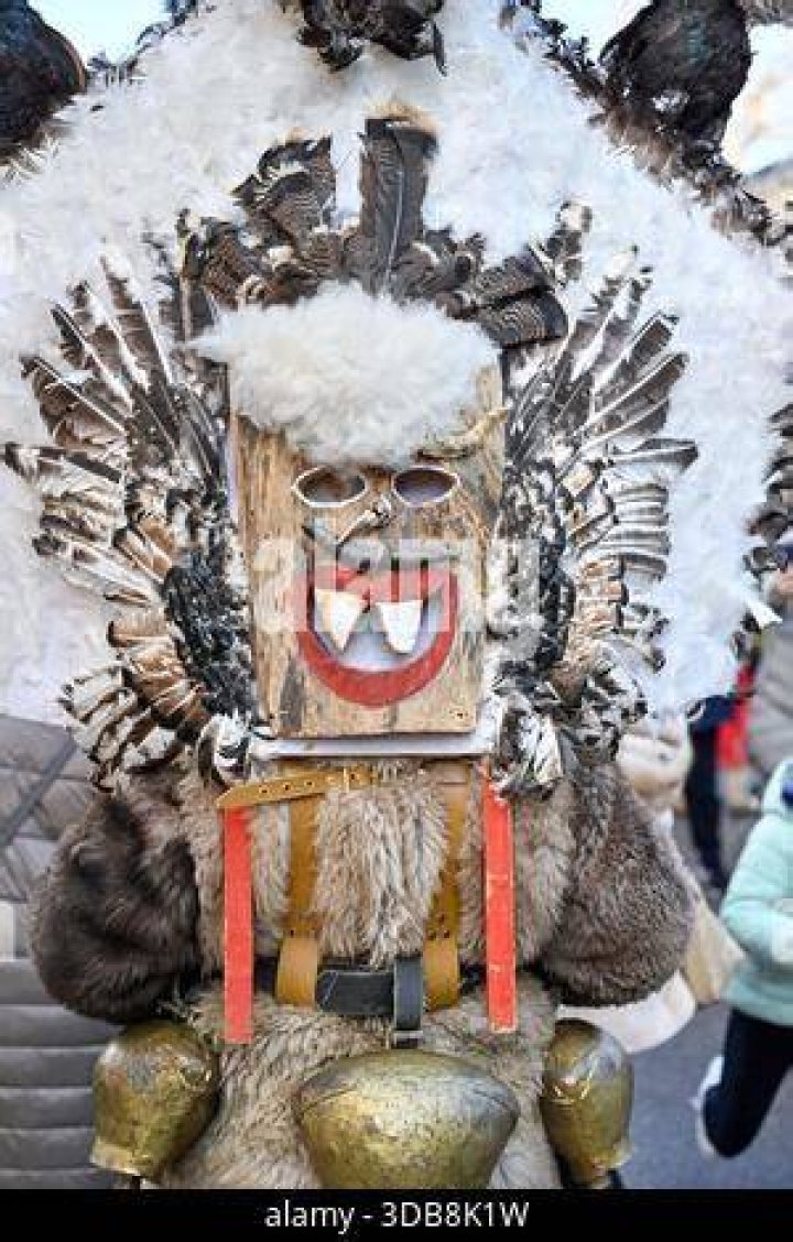 A Masked Performer Takes Part In The Bel