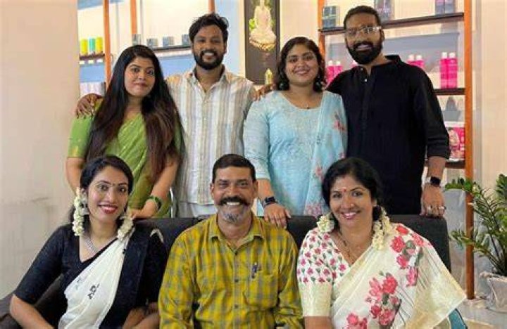 Bhagya Suresh chilhdood picture with her father and siblings