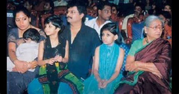 Childhood image of Tejaswini Vivek with her family