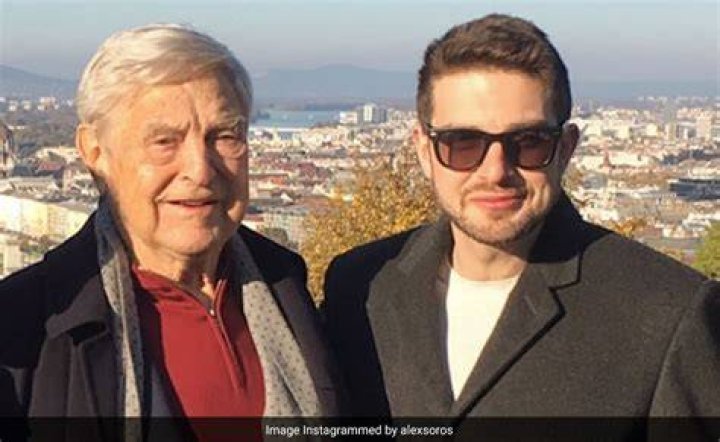 George with his son and wife Candace Owens