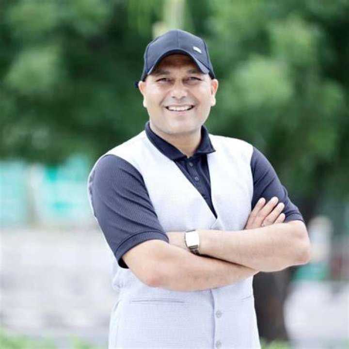 Harshvardhan Jain posing with the Rajasthan Ranjis