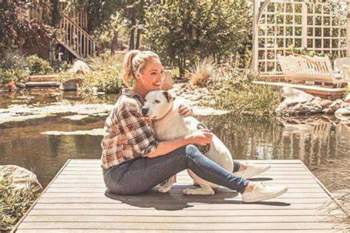 Katherine with her pet dog Koa The Doodle
