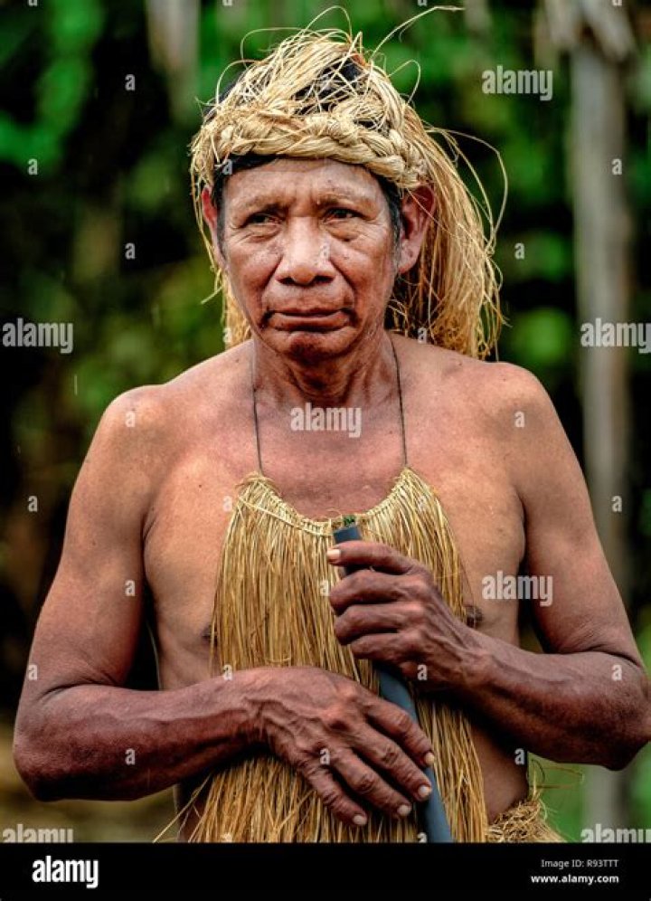 Man In Peruvian Amazon With Pot