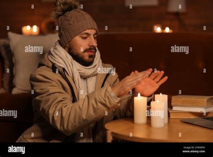 Man Smoking Near Candles