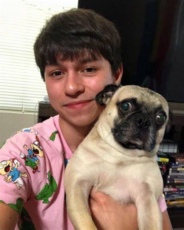 Mikey Angelo with his pet dog