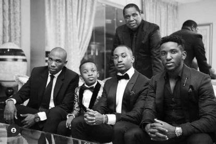 Sim Dope with his father and siblings