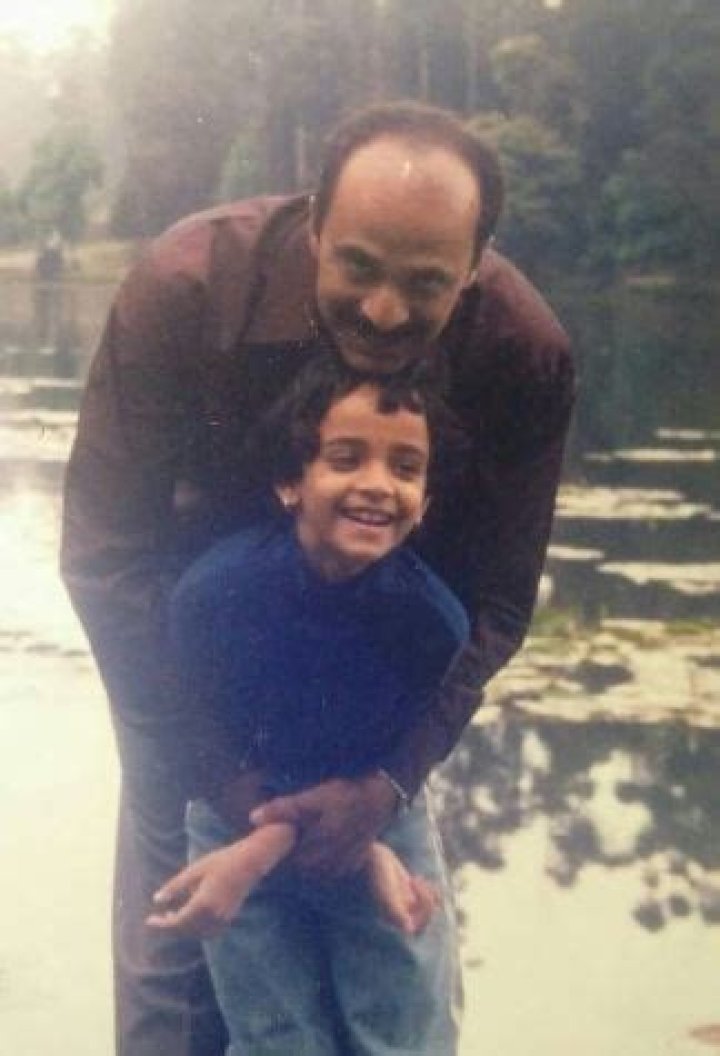 Young Anjali with her dad