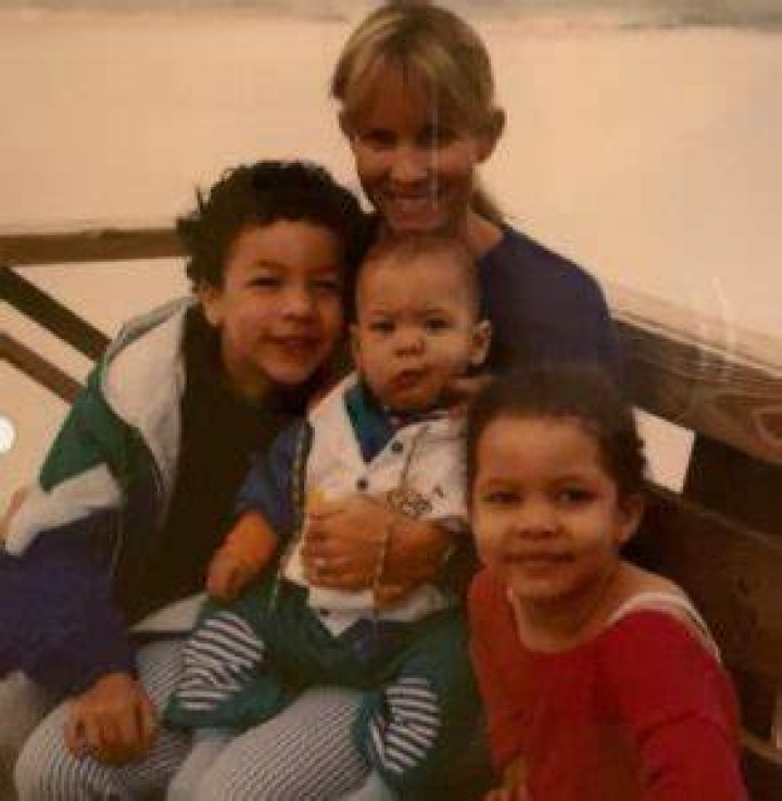 Young Callie with her mom and siblings